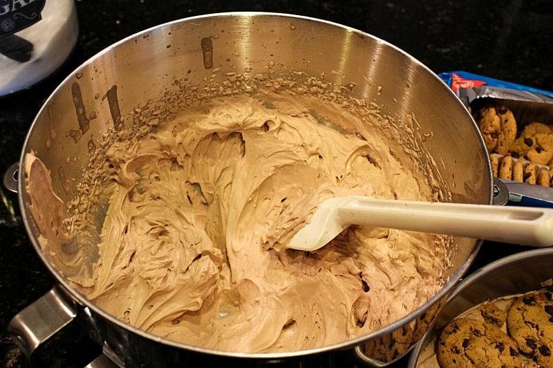 Velvety whipped cream filling and crunchy cookies makes this no-bake Chocolate Chip Cookie Ice Box cake the perfect dessert for all your special occasions. #mustlovehomecooking