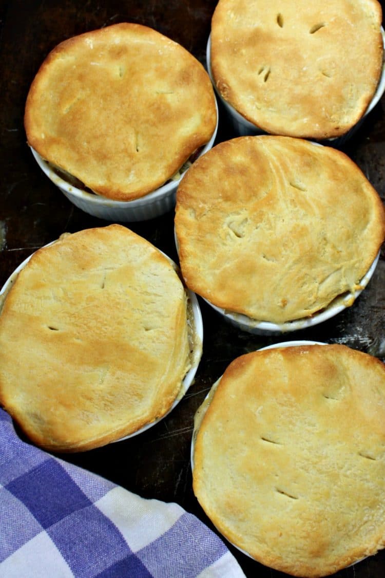 Slow Cooker Chicken Pot Pie is chicken, vegetables and savory gravy, topped with a flaky crust.