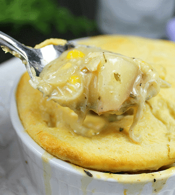Slow Cooker Chicken Pot Pie is chicken, vegetables and savory gravy, topped with a flaky crust.