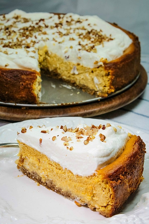 Fall parties and holidays are extra special with a rich and creamy homemade Brown Sugar Pumpkin Cheesecake. Packed with seasonal flavor in every bite!