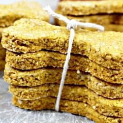 Oatmeal Pumpkin Homemade Dog Biscuits are easy to make crunchy treats that will have your best friend barking for more! Filled with wholesome ingredients like oat flour and pure pumpkin puree, you can feel good about giving them to your dog.