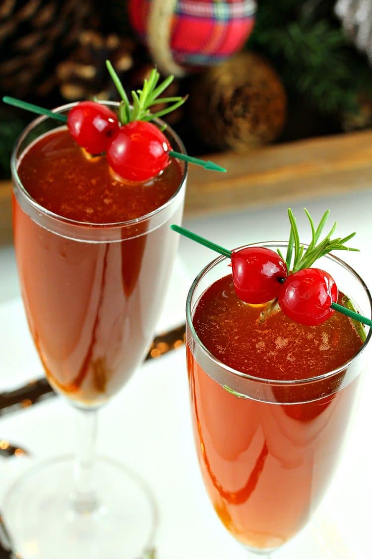 Make any occasion special with delicious Cherry Champagne Punch! Try this unique flavor combination of Cherry Liqueur and Rosemary!