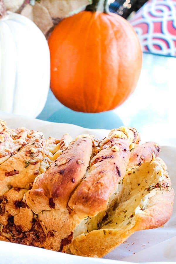 Garlic Parmesan Pull Apart Bread is a rustic, buttery loaf loaded with flavor and made from frozen bread dough. It looks fancy but it could not be easier to make.