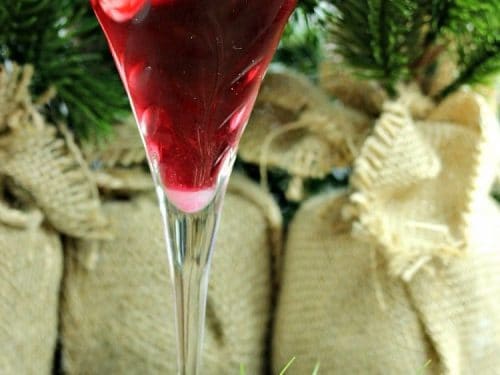 Surprise your guests by serving them a festive Pretty In Pink Martini made with vanilla vodka, Peppermint Schnapps and Pomegranate cocktail mixer. Garnish with a peppermint stick for extra cheer!