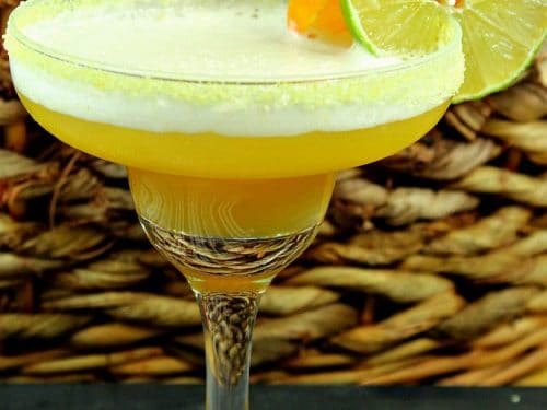 Enjoy a taste of the tropics with an Island Getaway Mojito - Stirrings Simple Mojito Cocktail Mix, dark rum and citrus juices will make you feel like the sun is shining on your shoulders and there is warm sand between your toes!