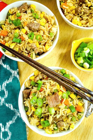 Pork and Vegetable Ponzu Fried Rice is better than take-out! Ponzu gives this fried rice a refreshing hint of citrus flavor and is lighter than standard soy sauce!