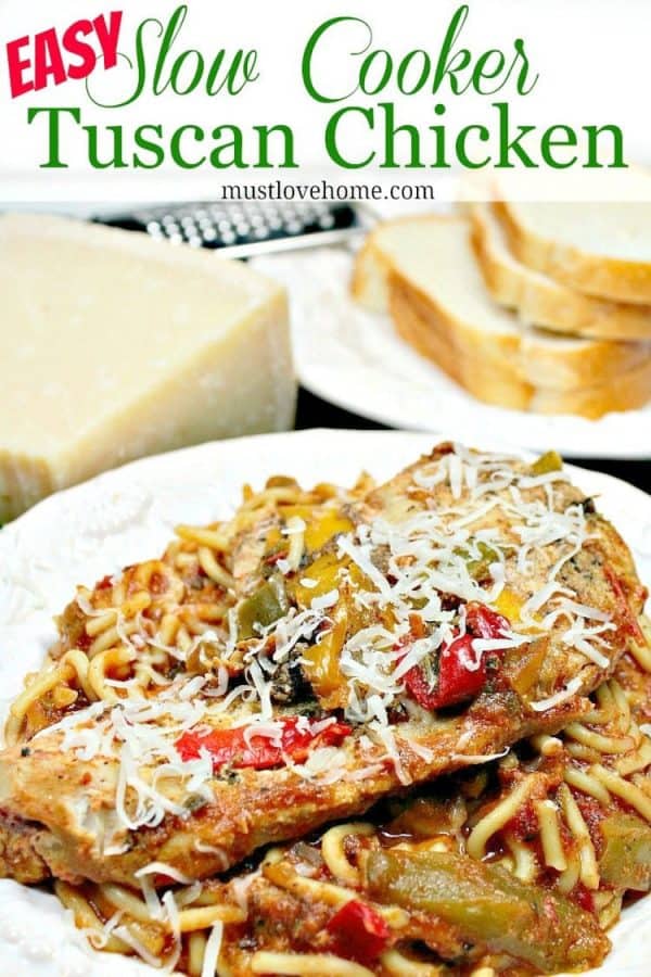 Easy Slow Cooker Tuscan Chicken is tender chicken, seasoned with peppers and Italian herbs, served on a bed of pasta!