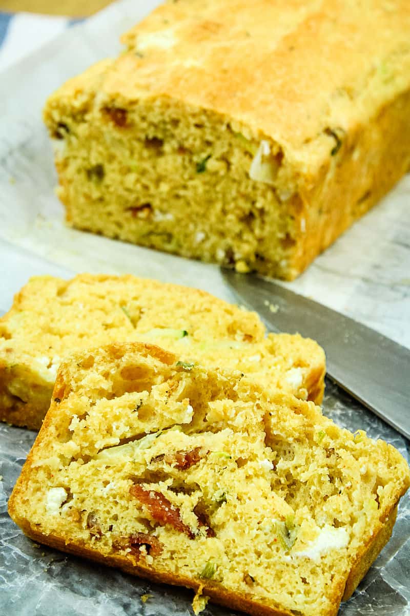 Goat Cheese Bacon Zucchini Quick Bread is a savory loaf filled with creamy goat cheese, smoky bacon and tender zucchinI. #mustlovehomecooking