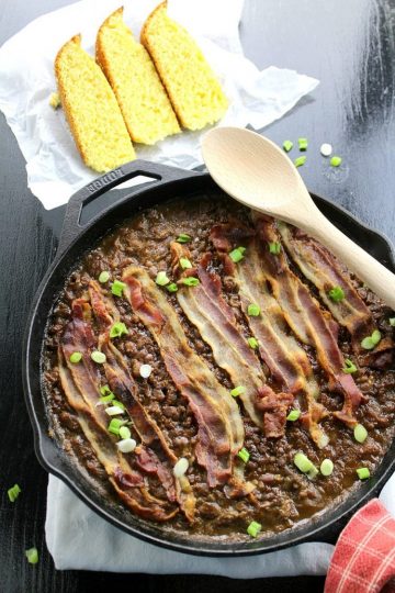 Loaded with Beef, Italian sausage and Bacon and dripping with tangy sauce, this Meat Lovers Skillet Baked Beans is both comfort food and a satisfying meaty meal.