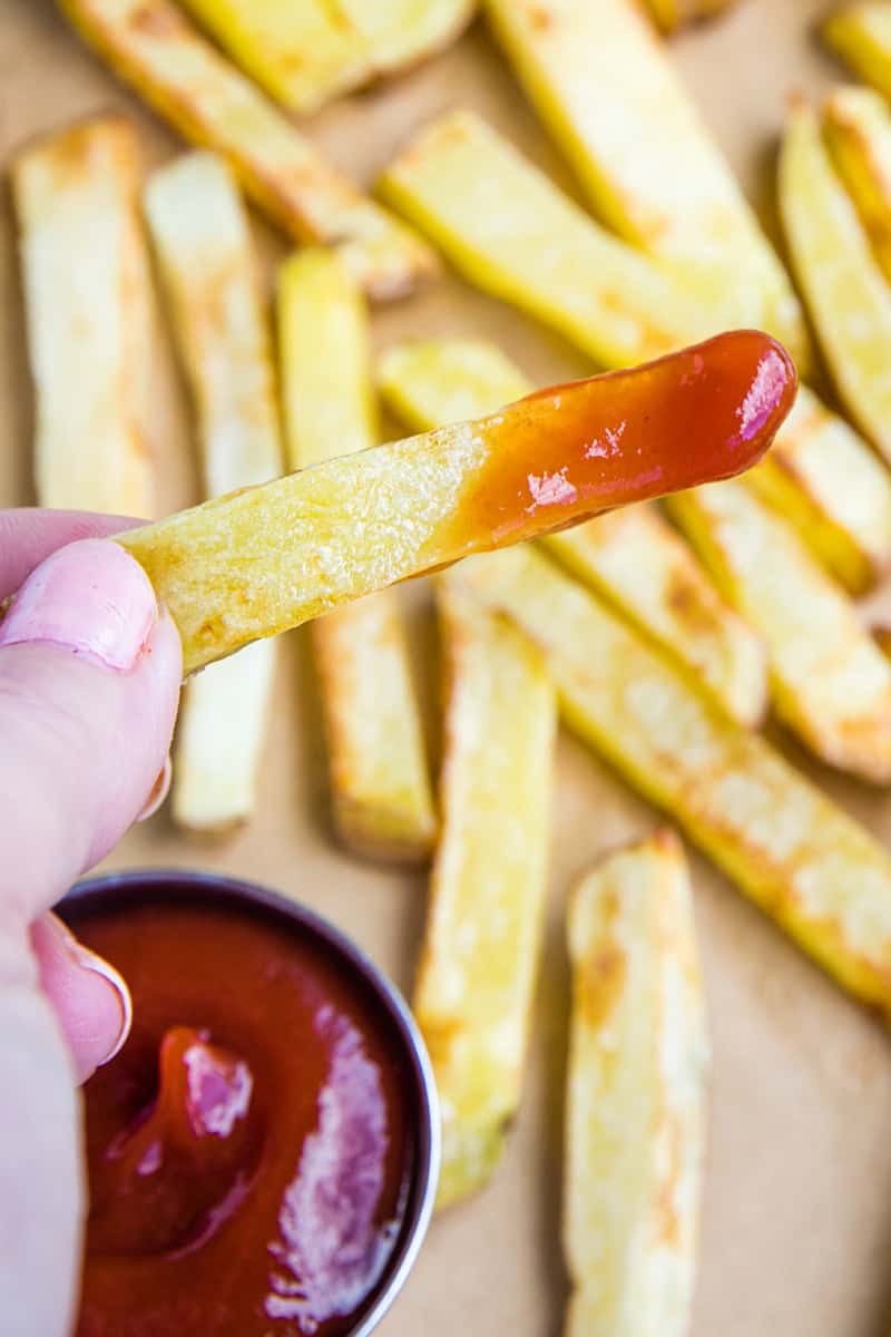 Air Fryer French Fries are a delicious way to enjoy hot and fresh fries at home. Fast and easy with little to no oil! #mustlovehomecooking