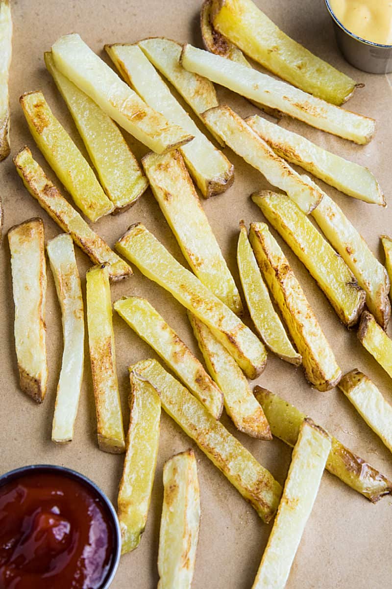 Air Fryer French Fries are a delicious way to enjoy hot and fresh fries at home. Fast and easy with little to no oil! #mustlovehomecooking