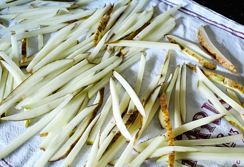 soaked potatoes drying on paper towel