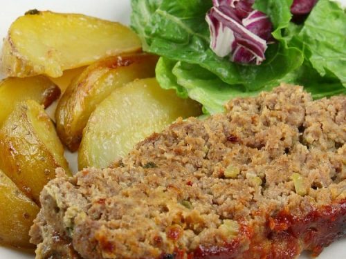 Classic Meatloaf - All seasoned and sauced up, this Southern meatloaf recipe uses celery, green onions, a bit of garlic and chili sauce for incredible flavor. This no-fail, kid approved recipe is sure to become a family favorite.