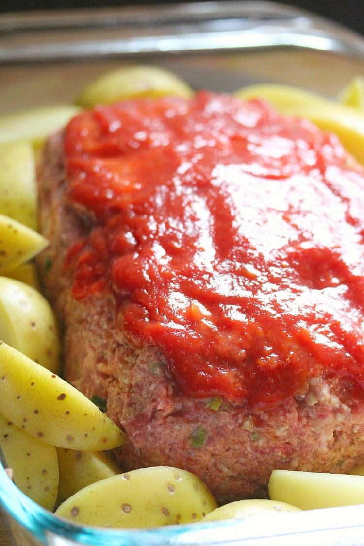 Classic Meatloaf - All seasoned and sauced up, this Southern meatloaf recipe uses celery, green onions, a bit of garlic and chili sauce for incredible flavor. This no-fail, kid approved recipe is sure to become a family favorite.