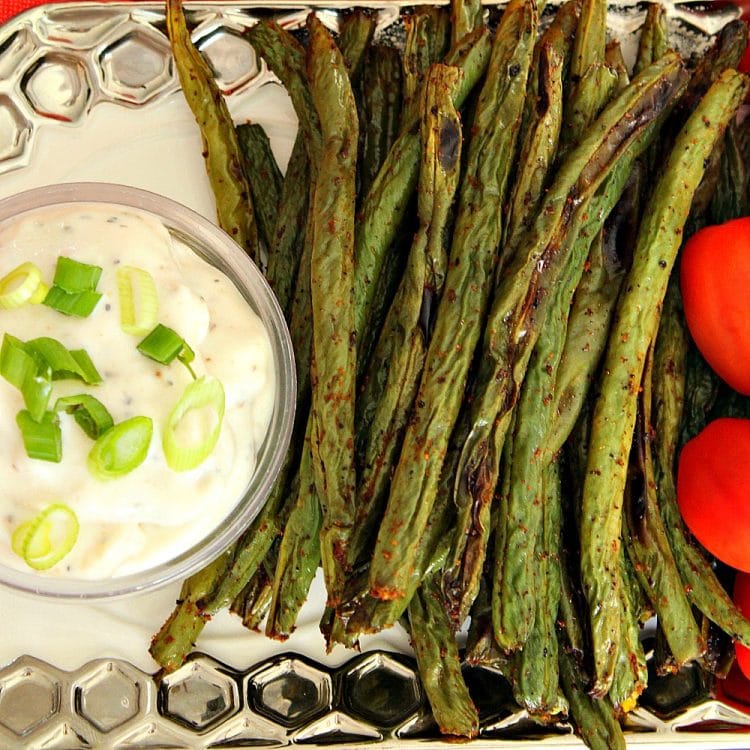 Fiesta Green Beans - serve something different on your next veggie tray. Crispy and spicy and charred to perfection, Fiesta green Beans are perfect for dipping into your favorite sauce. And they are healthy too, so how can anyone resist!