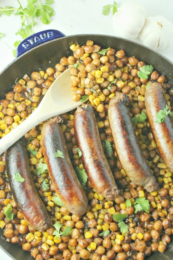 Chipotle Sausage and Bean Bake is crispy sausages beans and corn smothered in chipotle puree.