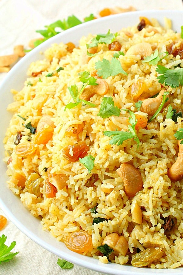 Red Curry Rice with Raisins and Cashews is an easy meal that packs a big flavor punch and is ready in minutes.