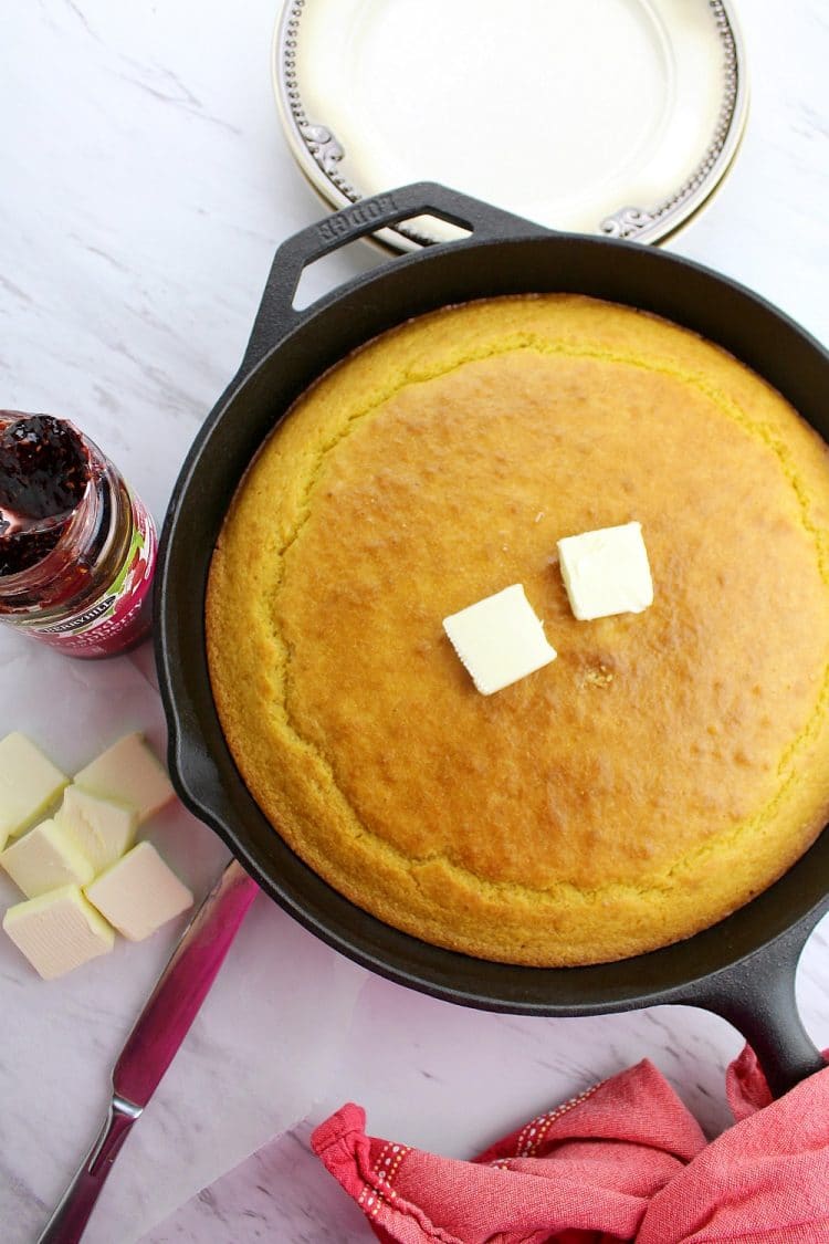 Whip up this moist and fluffy Easy Cornbread Recipe and leave your regular bread or biscuits behind. Soft on the inside with a deliciously crisp top crust, this recipe is a keeper.