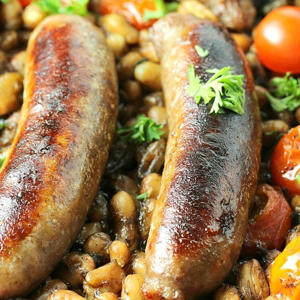 Italian Sausage Bean and Tomato Bake is a weeknight winner with crackling sausage, northern beans, juicy tomatoes and Italian seasoning.