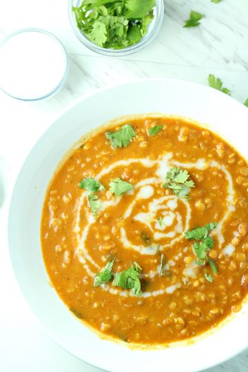 Curry Lentil and Coconut Soup with added zest from tomato, garlic, onion and ginger is a vegetarian delight! Even meat lovers are raving! #mustlovehomecooking