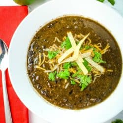 Spicy and delicious, this hearty vegetarian Tequila Black Bean Soup takes BOLD flavor to the next level. Loaded with chipotle peppers in adobo, jalapeno peppers, black beans and a splash of Tequila it's perfect on it's own or a side for tacos, burritos and quesadillas.