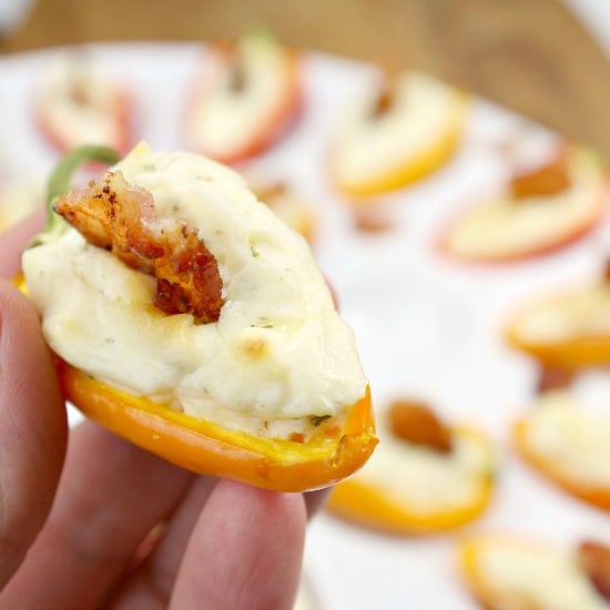 Bacon Ranch Mini Pepper Popper - the perfect little appetizer. A sweet mini bell pepper, stuffed with ranch spiked cream cheese then topped with a bite of crispy bacon!