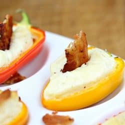 Bacon Ranch Mini Pepper Popper - the perfect little appetizer. A sweet mini bell pepper, stuffed with ranch spiked cream cheese then topped with a bite of crispy bacon!