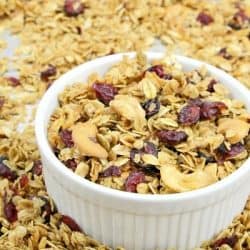 Homemade Fruit and Nut Granola could not be easier to make using this simple recipe. A healthy mix of oats, cranberries, sunflower seeds, coconut and cashews are splashed with a maple syrup mixture