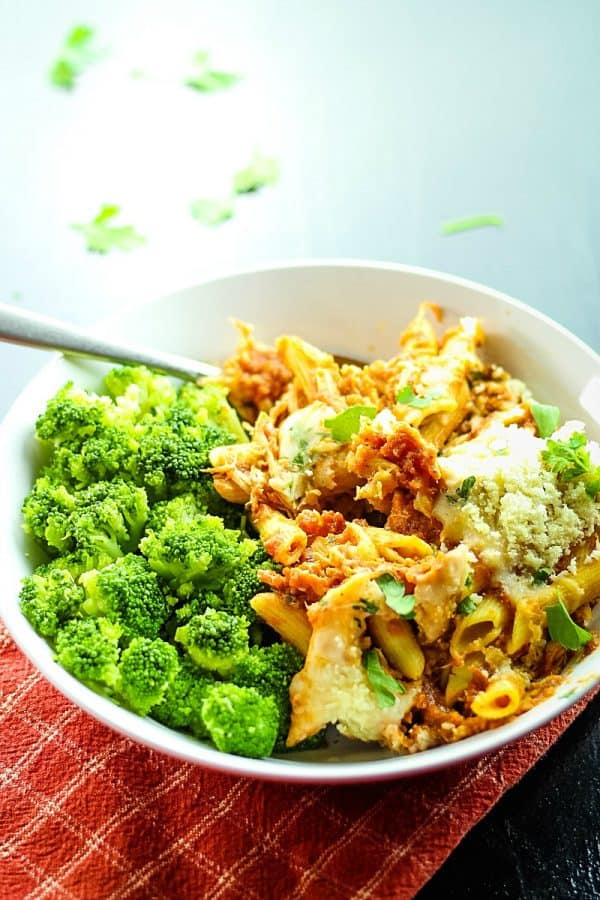 Slow Cooker Chicken Parmesan with Penne Pasta - tender chicken, tangy sauce and velvety melted cheese - this entire Italian classic is made in the slow cooker, even the pasta!