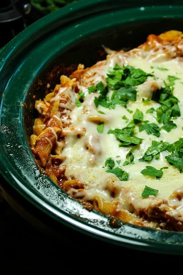 Slow Cooker Chicken Parmesan with Penne Pasta - tender chicken, tangy sauce and velvety melted cheese - this entire Italian classic is made in the slow cooker, even the pasta!