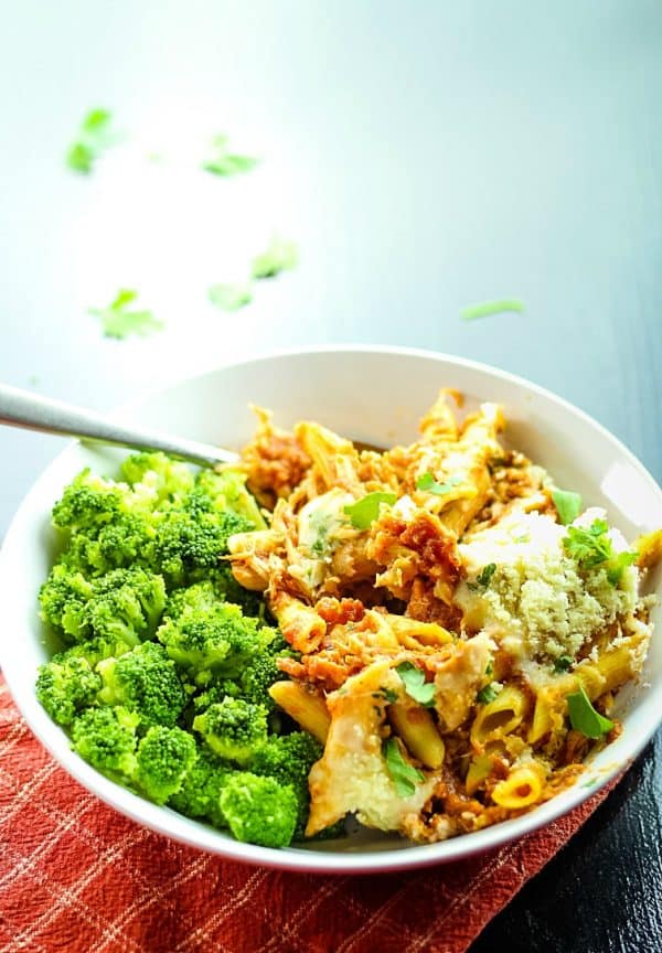 Slow Cooker Chicken Parmesan with Penne Pasta - tender chicken, tangy sauce and velvety melted cheese - this entire Italian classic is made in the slow cooker, even the pasta!
