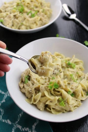 Slow Cooker Herb Chicken Noodles is an easy take on the old-fashioned casserole recipe. With chunks of flavorful chicken and a velvety sauce, this meal will be an instant hit! Bonus...the pasta is cooked right in the slow cooker....no extra pots needed.