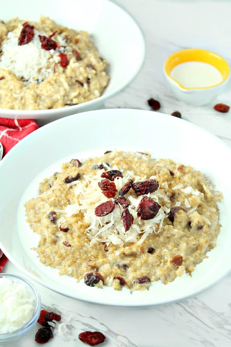 Slow Cooker Cranberry Coconut Oatmeal is made with creamy coconut milk, steel cut oats, chewy dried cranberries, brown sugar and pie spice.