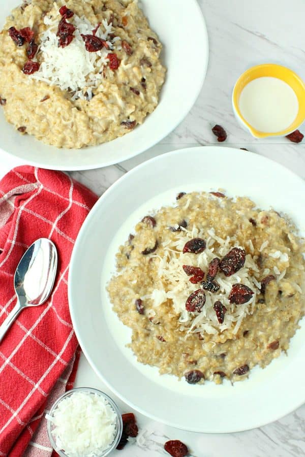 Slow Cooker Cranberry Coconut Oatmeal is made with creamy coconut milk, steel cut oats, chewy dried cranberries, brown sugar and pie spice.