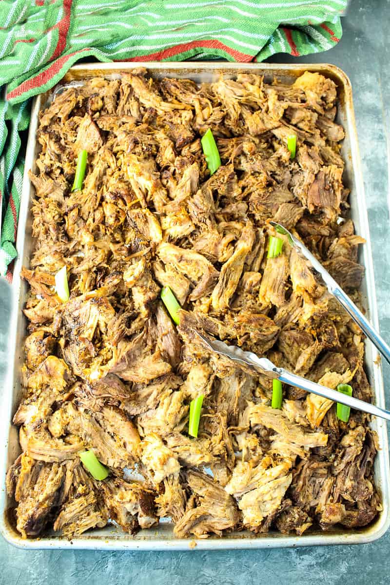 Crispy Pork Carnitas are baked low and slow until fall apart delicious, then finished under the broiler so the edges are caramelized and extra crisp. #mustlovehomecooking