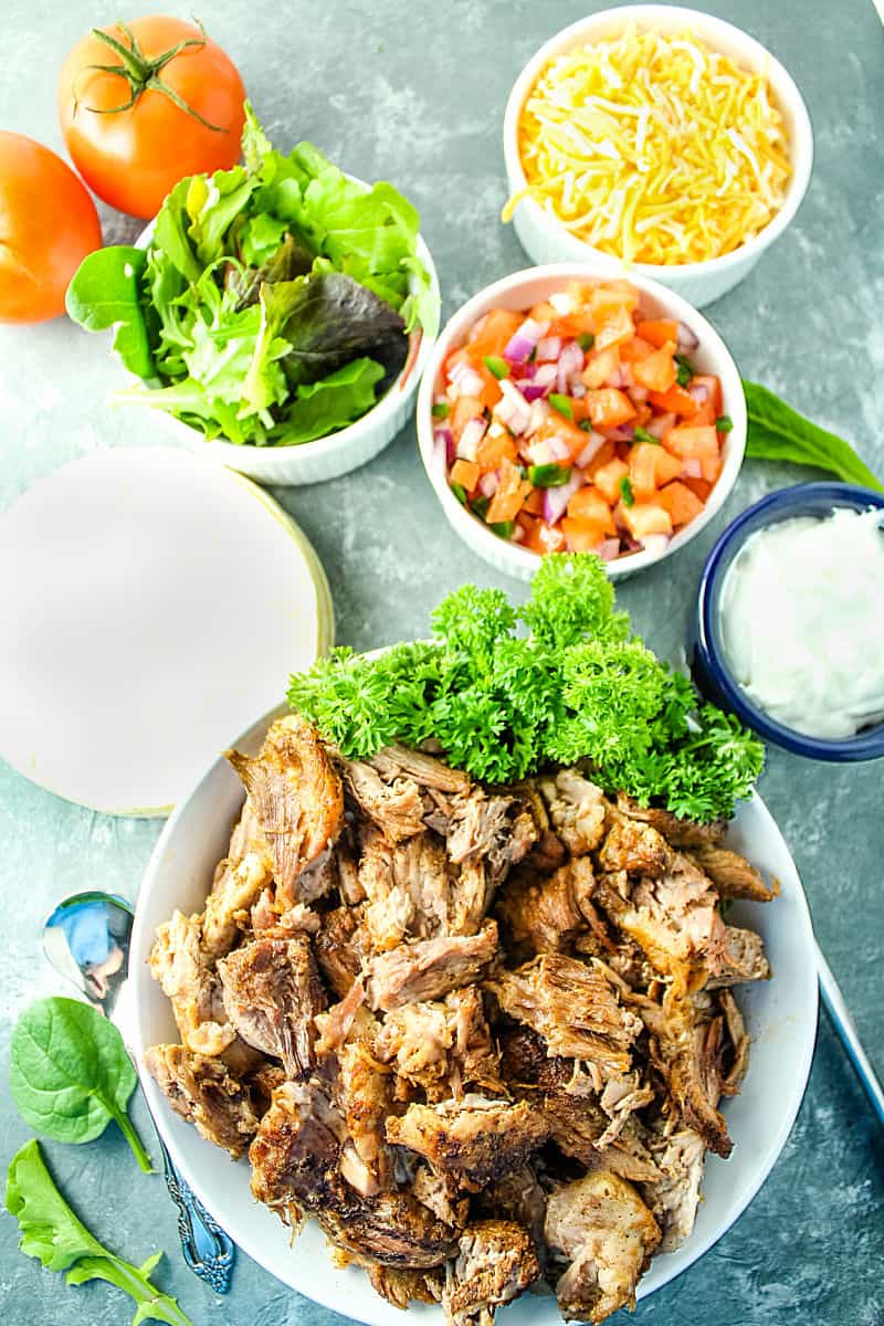 Crispy Pork Carnitas are baked low and slow until fall apart delicious, then finished under the broiler so the edges are caramelized and extra crisp. #mustlovehomecooking