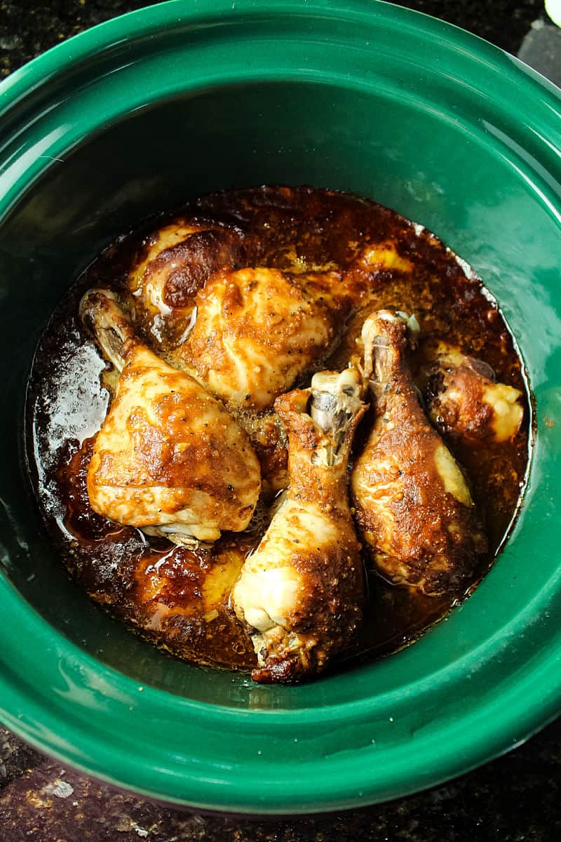 Slow Cooker Barbecue Chicken is made easy in the crock pot with moist chicken legs and an addictive savory sweet barbecue sauce.  #mustlovehomecooking