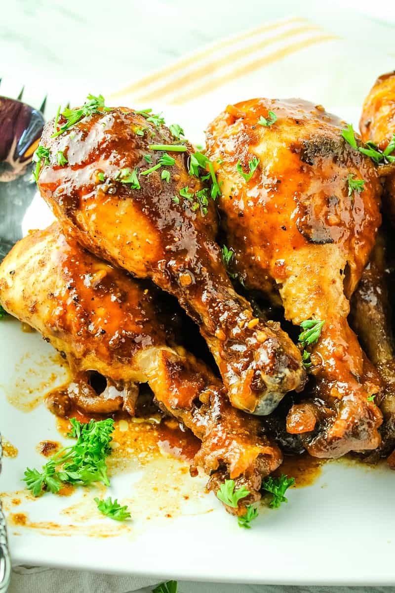 Slow Cooker Barbecue Chicken is made easy in the crock pot with moist chicken legs and an addictive savory sweet barbecue sauce.  #mustlovehomecooking