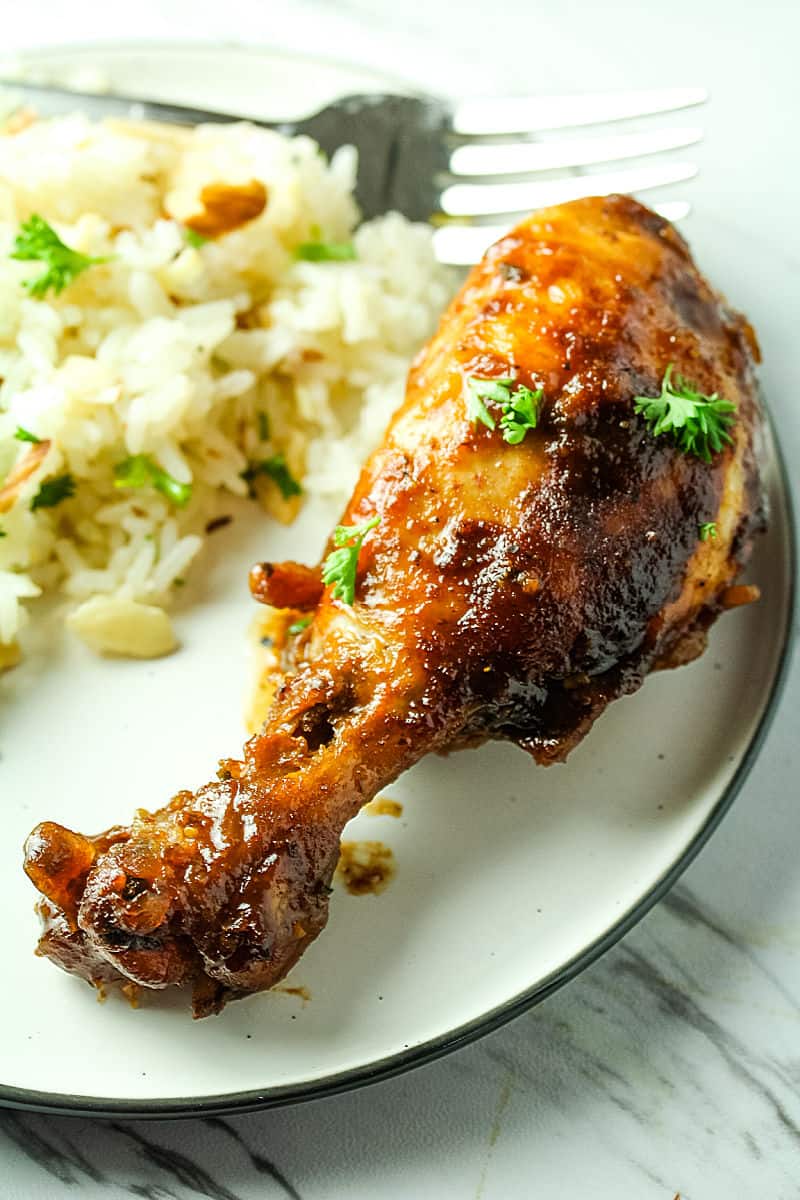 Slow Cooker Barbecue Chicken is made easy in the crock pot with moist chicken legs and an addictive savory sweet barbecue sauce.  #mustlovehomecooking