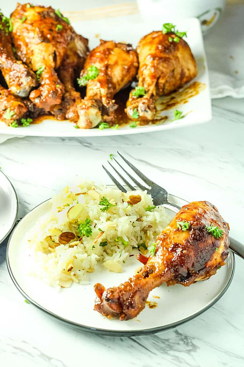 Slow Cooker Barbecue Chicken is made easy in the crock pot with moist chicken legs and an addictive savory sweet barbecue sauce.  #mustlovehomecooking