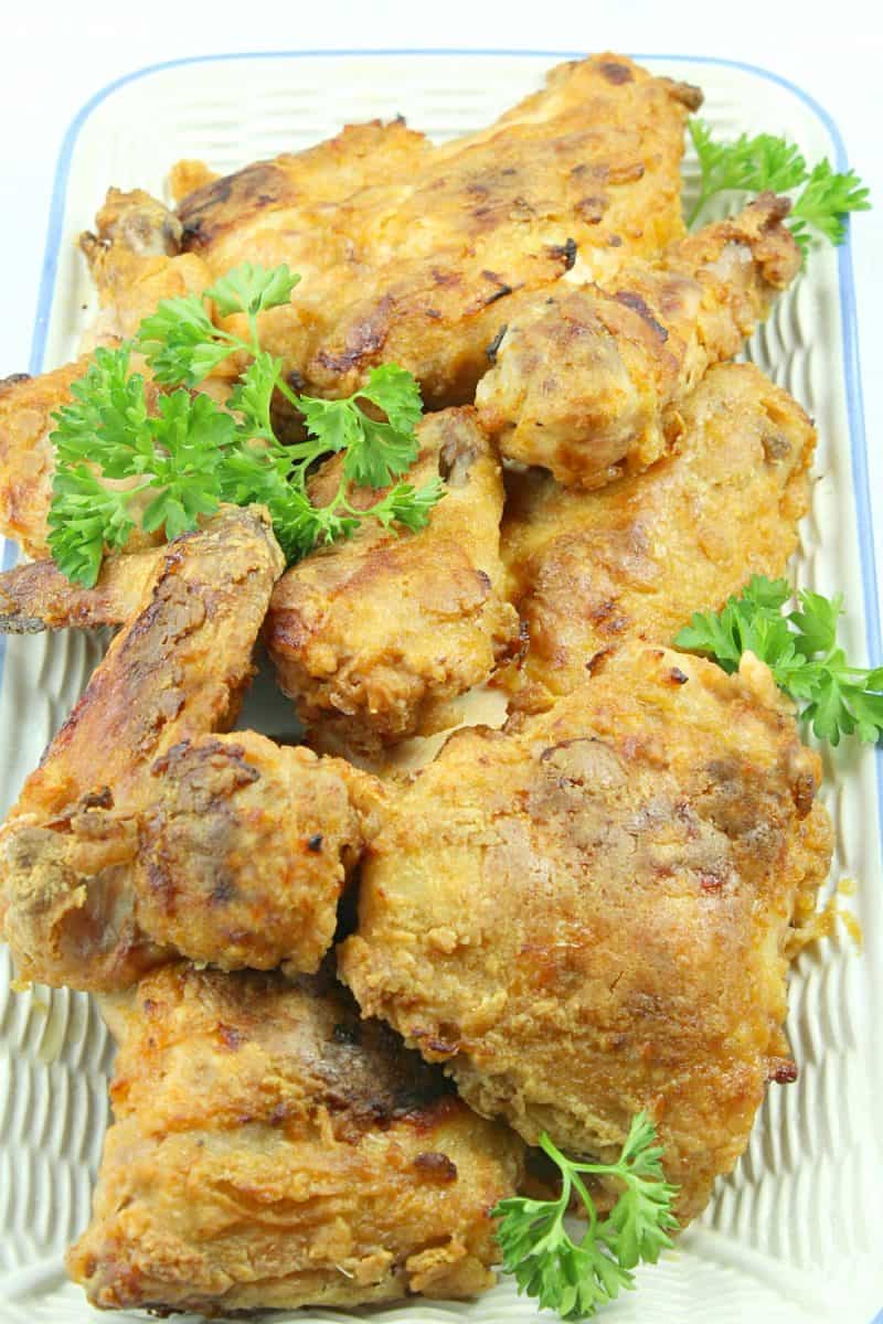 Buttermilk Oven Fried Chicken is a spicy, crunchy and healthier way to satisfy your fried chicken cravings but with  no oil spatter. It's crispy and moist right from the oven!