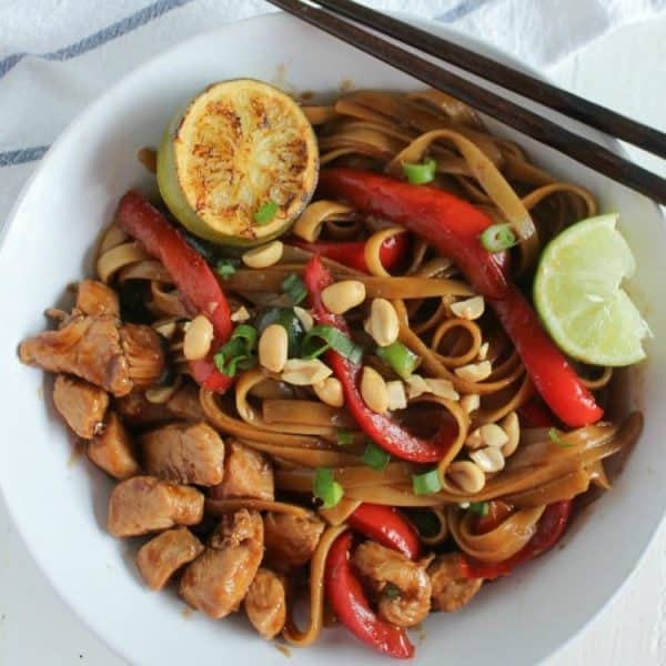 Pad Thai Chicken in a bowl with chopsticks