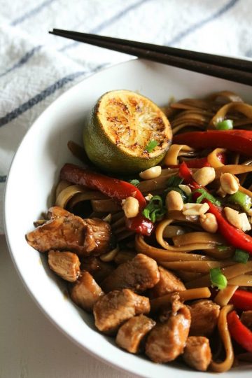 Pad Thai Chicken are moist chunks of savory chicken, tender red pepper rings and creamy noodles bathed in a soy sauce vinaigrette will have your mouth watering from start to tangy finish.