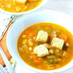 Three Bean Ham Soup in white bowl