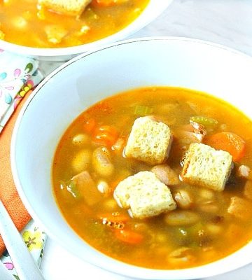 Three Bean Ham Soup in white bowl