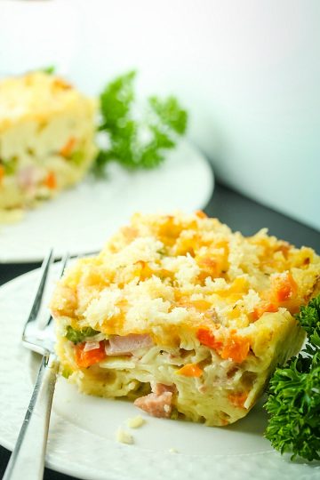 Ham, peas, carrots and wide egg noodles combine for a Smoked Ham Peas and Carrots Bake that tastes like an indulgence but is ready to share in under 30 minutes.
