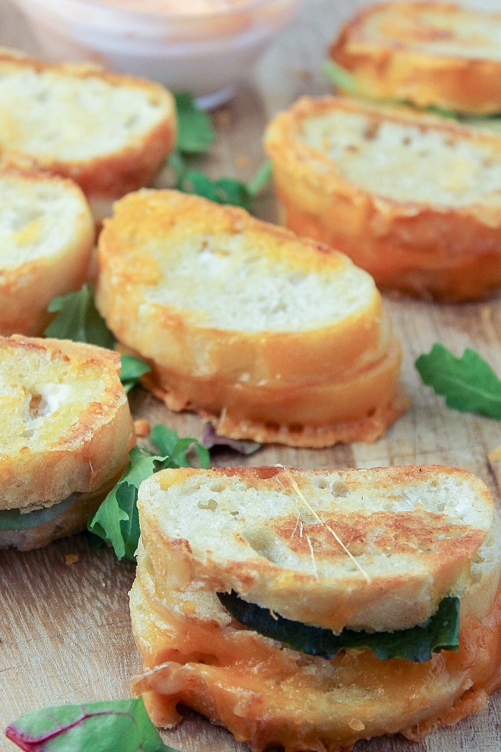 Dripping with gooey cheese, 20 Minute Mini Grilled Cheese Appetizers are a twist on the classic that everyone will love. Make a bunch of these diner-style specials because they disappear fast and your crowd will be clamoring for more!