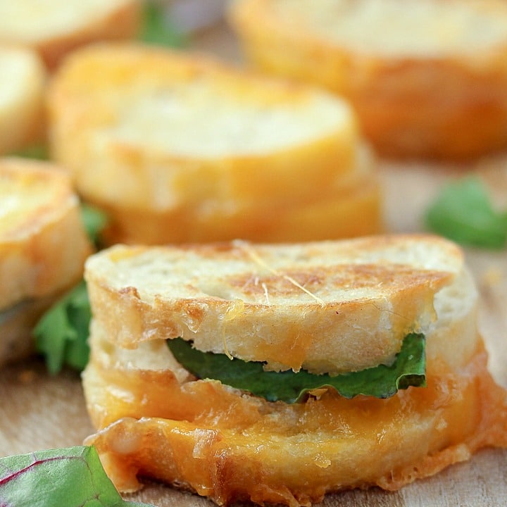 Dripping with gooey cheese, 20 Minute Mini Grilled Cheese Appetizers are a twist on the classic that everyone will love. Make a bunch of these diner-style specials because they disappear fast and your crowd will be clamoring for more!