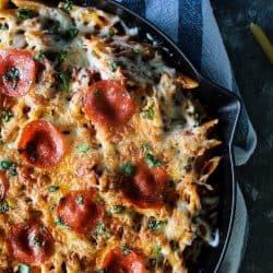 One Pan Pepperoni Pizza Pasta let's you enjoy the taste of your pasta and pizza favorites in the same dish! Spicy pepperoni, velvety pasta and oozing melted cheese makes this 30 minute recipe an easy choice to add to your favorites!