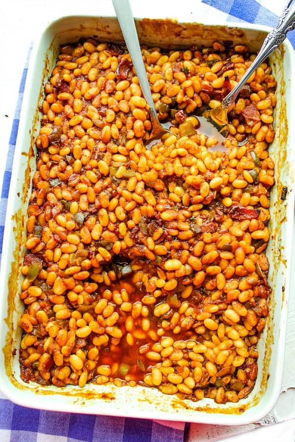 A classic brown sugar, vinegar and mustard syrup makes these From Scratch Cola Baked Beans a hit every time!